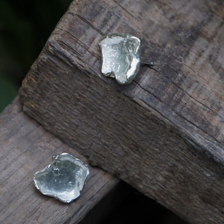 Chic irregular sterling silver stud earrings offer minimalist statement ear decor with a unique handcrafted design