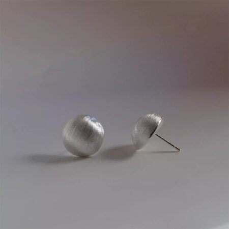 Minimalist Chic Sterling Silver Brushed Half Dome Stud Earrings offer timeless elegance and unique style for any occasion